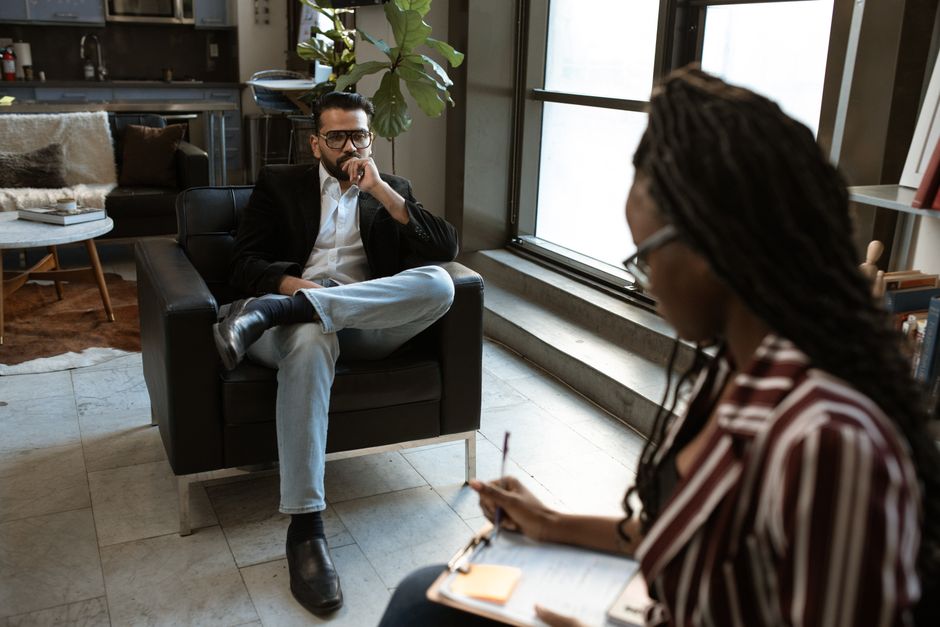 Coach and client in a one-to-one coaching session