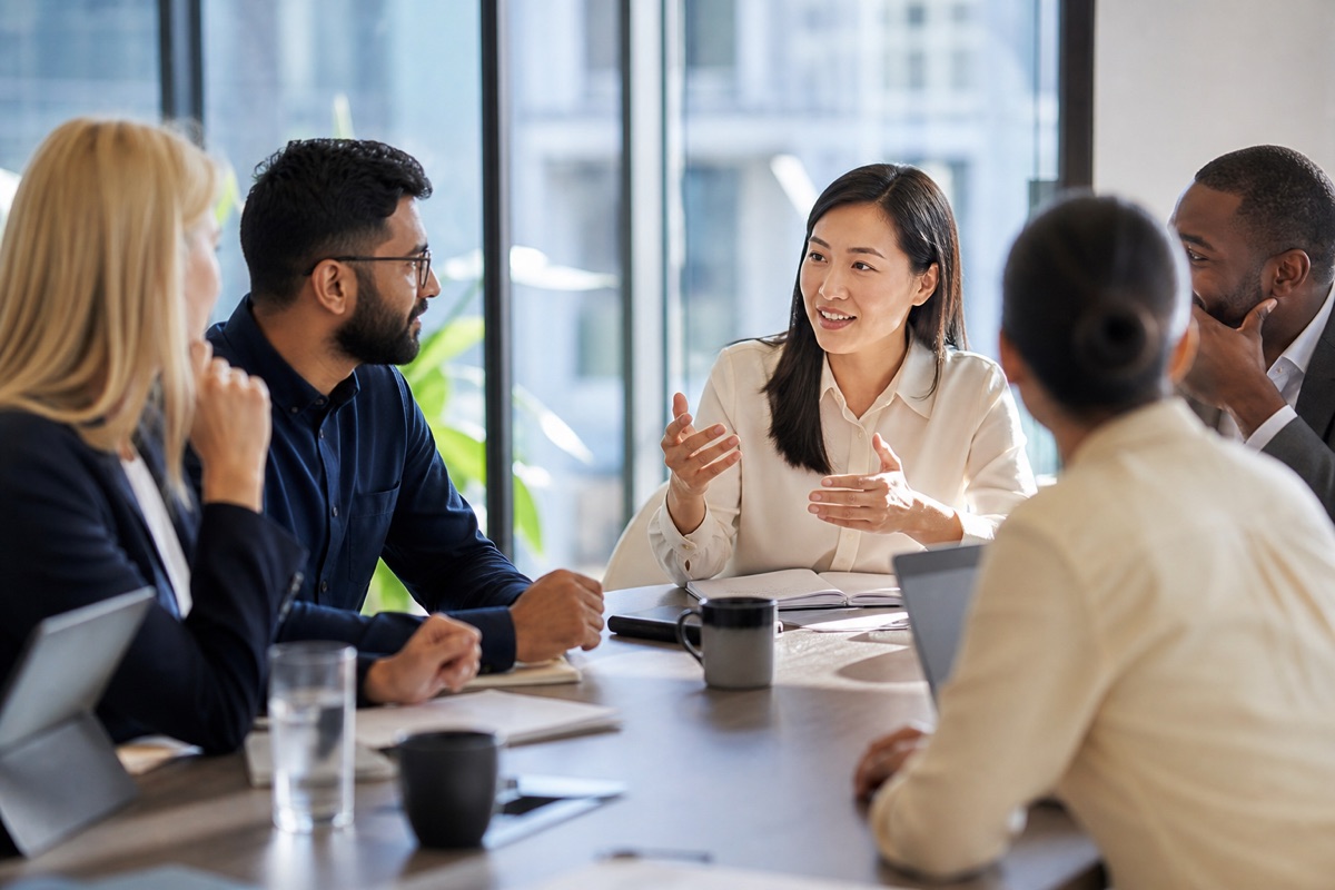 Professional speaking confidently in a meeting