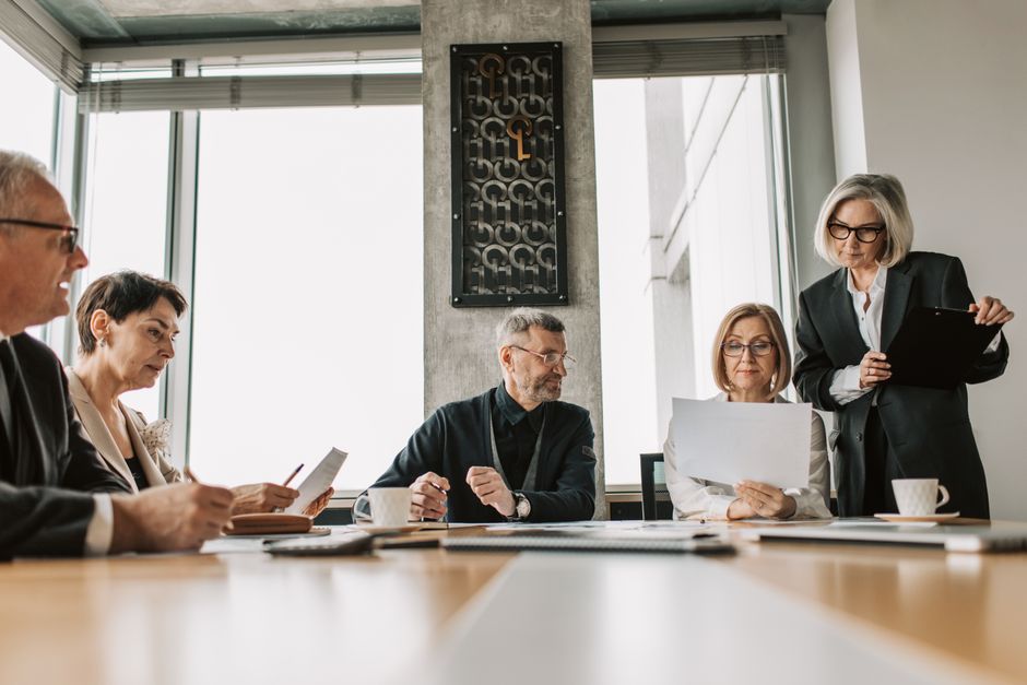 Functional executive leaders in a meeting